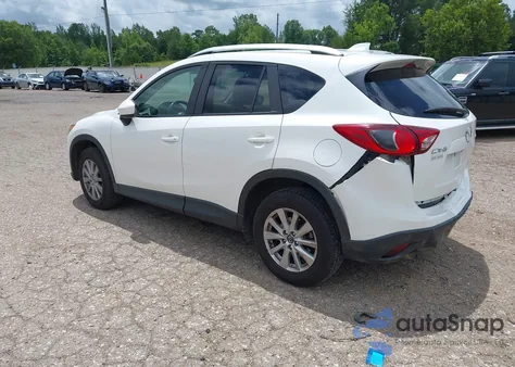 2014 Mazda Cx-5 Touring from USA, damaged, VIN JM3KE2CY1E0396090